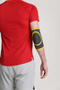 Black elbow support sleeve with integrated protective padding for joint stability.