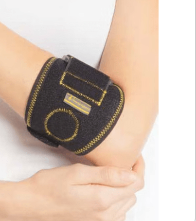 Close-up of a black neoprene elbow brace with yellow stitching and circular pad support, worn on a person's arm.