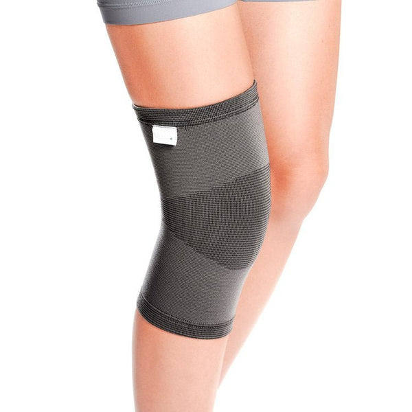  Knee support brace with silicone pad for joint stability, pain relief, and comfortable fit during physical activity.