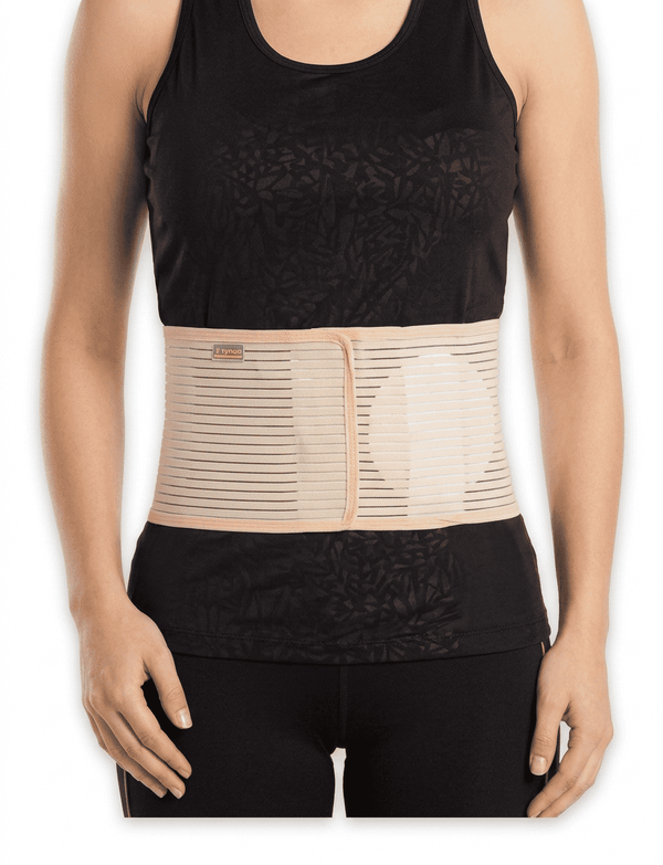  A specialized firm silicone pad on a navel hernia belt for targeted pressure and relief.